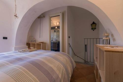 Ліжко або ліжка в номері La Casa di Sandra a Noli