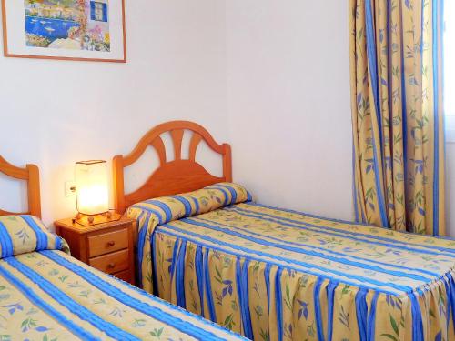 Postel nebo postele na pokoji v ubytování Apartment Los Gemelos-2 by Interhome