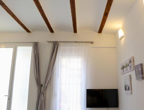 Телевизор и/или развлекательный центр в Balaustrada Apartments