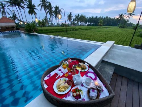 Kolam renang di atau di dekat The Sawah Resort & Villa