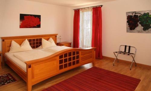 Postel nebo postele na pokoji v ubytování Hotel Weinblatt