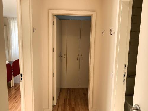 a hallway with two closets in a room at Up Estalagem dos Padres in Albergaria-a-Velha