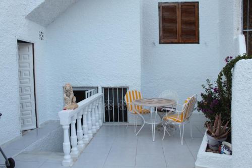 Balkón nebo terasa v ubytování Bungalow cerca de la playa de La Mata