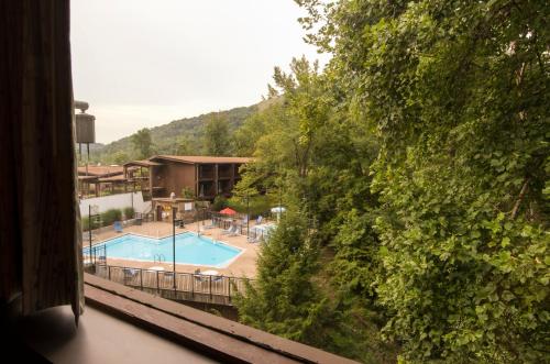 a view of a swimming pool from a window at Jenny Wiley State Resort Park in Prestonsburg