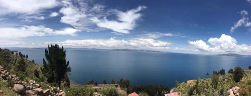 a view of a large body of water at Taquile Hospedaje Mario in Huillanopampa