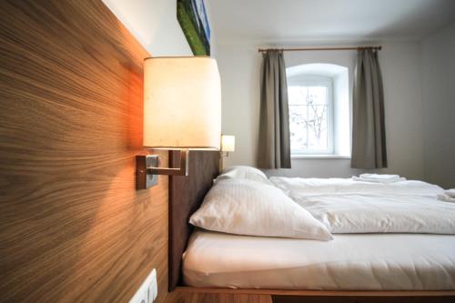 Ένα ή περισσότερα κρεβάτια σε δωμάτιο στο Lake view suites Villa Julia by we rent