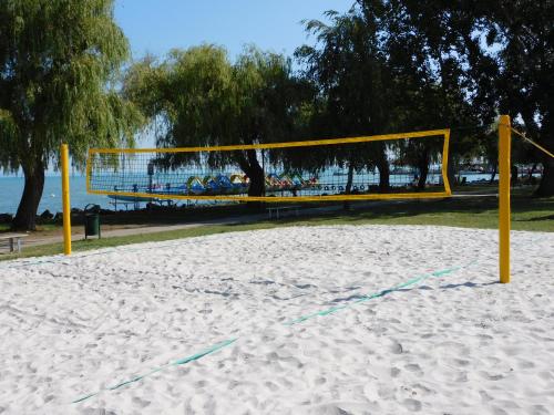 a volley ball net on a sandy beach at Katamaran in Siófok