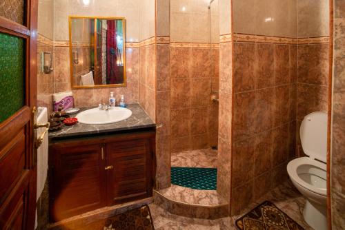 Ванная комната в Maison Famille Tazi