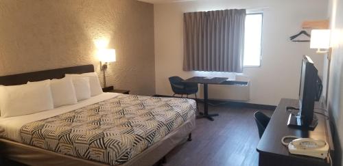 Un ou plusieurs lits dans un hébergement de l'établissement Motel 6-Elk Grove Village, IL - O'Hare
