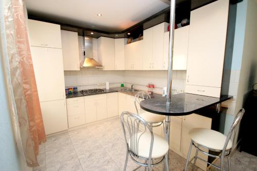 Kuchyň nebo kuchyňský kout v ubytování Inn Home Apartments - Pechersk area