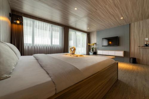 Postel nebo postele na pokoji v ubytování Kontena Hotel
