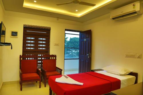 Katil atau katil-katil dalam bilik di karibu Residency
