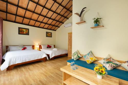 Katil atau katil-katil dalam bilik di Sparrow's Song Homestay