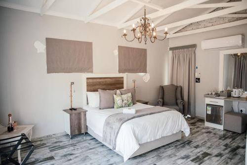 Ένα ή περισσότερα κρεβάτια σε δωμάτιο στο The Perfect Corner Guesthouse