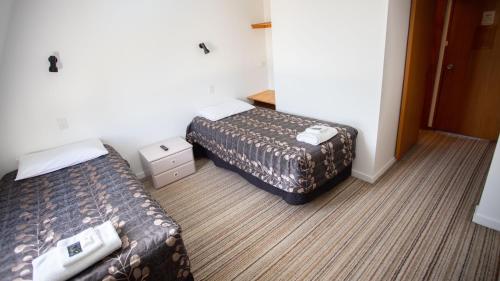 Katil atau katil-katil dalam bilik di Southern Cross Lodge Methven