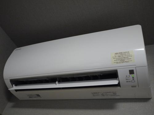 a white toaster oven sitting on top of a counter at Hotel Route-Inn Shinano Omachi Ekimae in Omachi