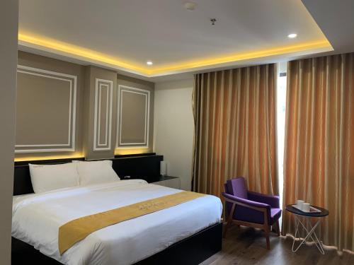 Ένα ή περισσότερα κρεβάτια σε δωμάτιο στο Hotel Villa Ju