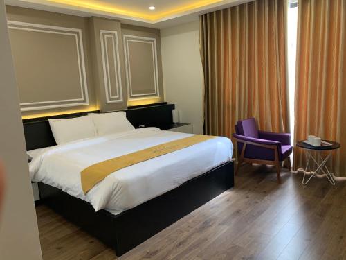 Ένα ή περισσότερα κρεβάτια σε δωμάτιο στο Hotel Villa Ju