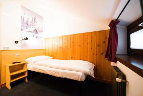 Postel nebo postele na pokoji v ubytování Hotel Teola