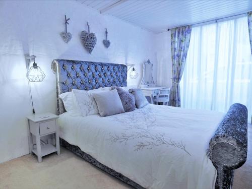 Katil atau katil-katil dalam bilik di The Coach House