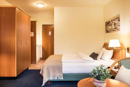 Ένα ή περισσότερα κρεβάτια σε δωμάτιο στο Sunderland Hotel