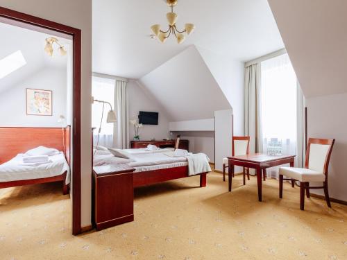 Postel nebo postele na pokoji v ubytování Hotel Skalite Spa & Wellness