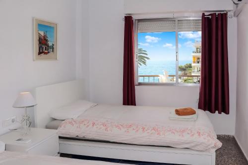 Postel nebo postele na pokoji v ubytování Acapulco Playa 308 Apartments Casasol