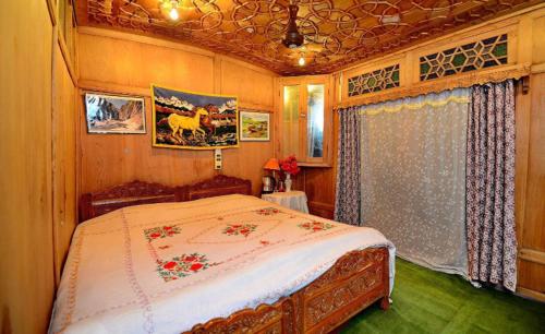 Ένα ή περισσότερα κρεβάτια σε δωμάτιο στο Umbrella group of House Boat