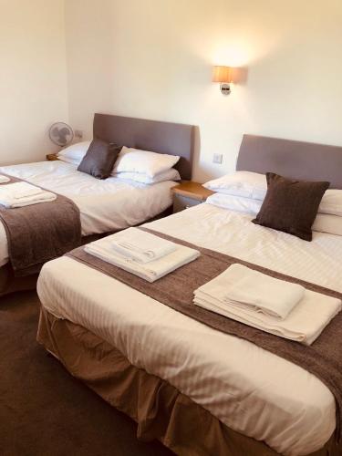 Letto o letti in una camera di The Players Golf Club