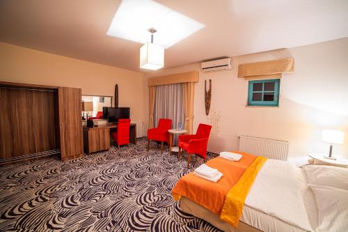 En eller flere senger på et rom på Hotel Cyprus