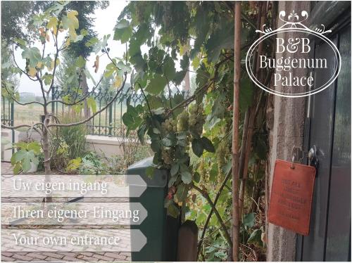 a sign for a building with a bunch of plants at B&B Buggenum Palace in Buggenum