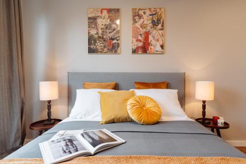 Säng eller sängar i ett rum på Mellow Apartment by LoftAffair