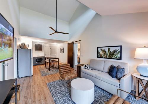 a living room with a couch and a table at Sea Palms Resort St Simons Island in Saint Simons Island
