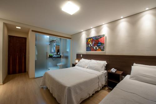 Posteľ alebo postele v izbe v ubytovaní Hotel Mount Everest
