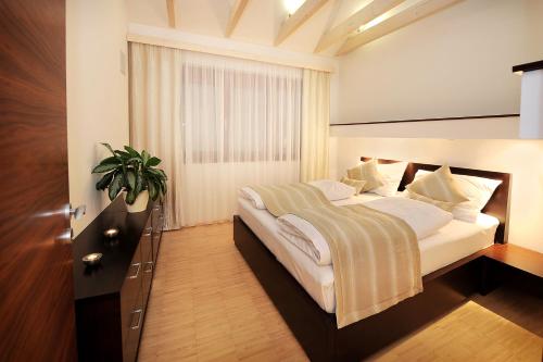 Postel nebo postele na pokoji v ubytování Hotel Biograf