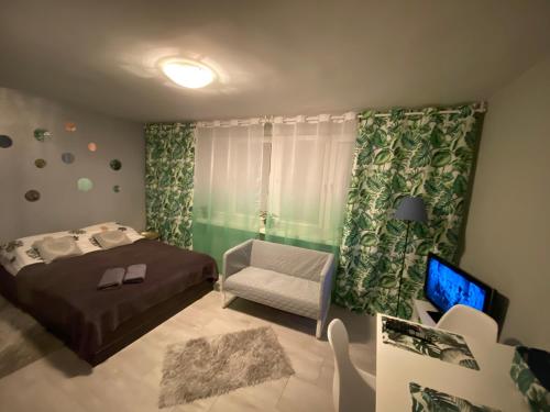 Posteľ alebo postele v izbe v ubytovaní Apartament Centrum Pańska