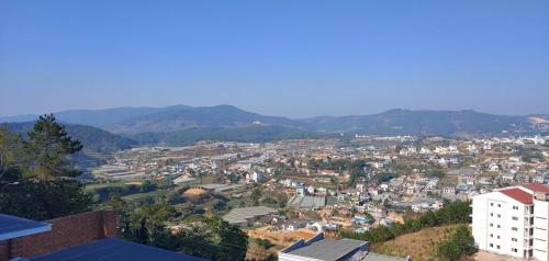 a view of a city with mountains in the background at Lavie Villa in Da Lat