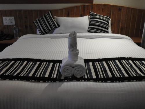 Postel nebo postele na pokoji v ubytování Babai Resort Pvt Ltd