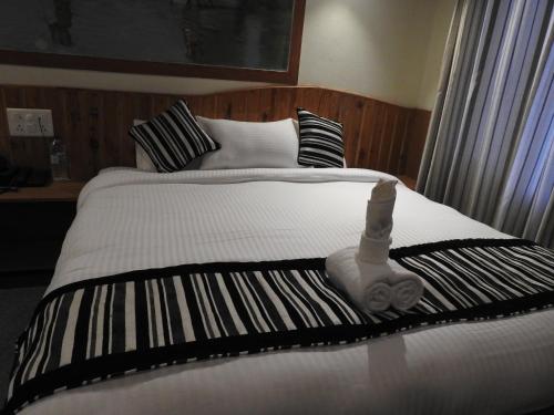 Postel nebo postele na pokoji v ubytování Babai Resort Pvt Ltd