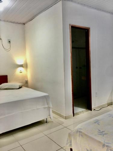 Hotel Pousada Hamburgoにあるベッド