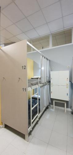 a room with two bunk beds in a room at Albergue Turistico la Credencial in Santiago de Compostela