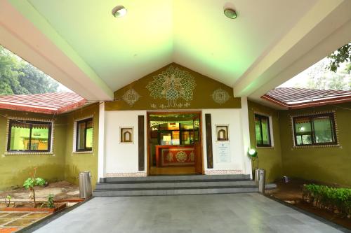 a building with a door in the middle of it at TOURIST VILLAGE KHAJURAHO in Khajurāho