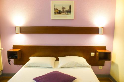 Ένα ή περισσότερα κρεβάτια σε δωμάτιο στο Hotel Estoril Porto