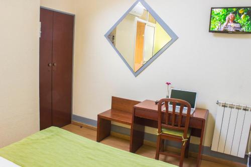 Ένα ή περισσότερα κρεβάτια σε δωμάτιο στο Hotel Estoril Porto