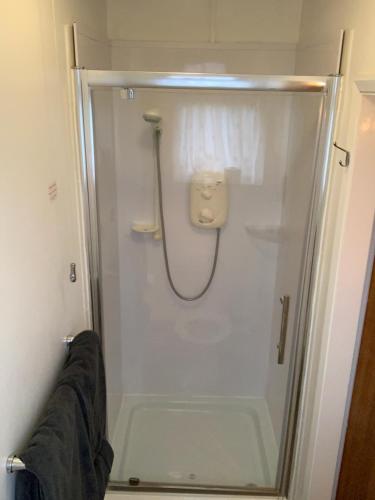 a shower stall in a bathroom with a shower at YO10 in York