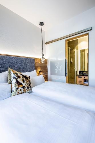Hotel Zum Stemplinger Hanslにあるベッド