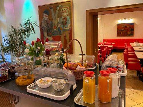 a buffet of food on a table in a restaurant at Bornholmer Hof im Prenzlauer Berg in Berlin