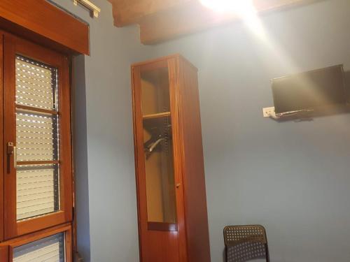a corner of a room with a door and a window at ALBOR II in Gijón