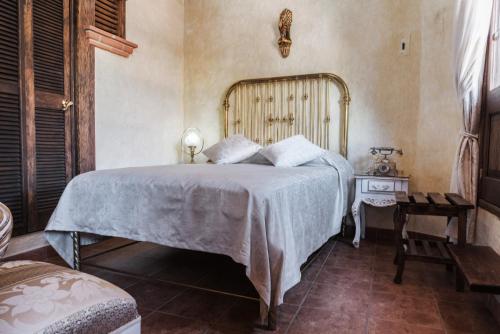 Кровать или кровати в номере Na-anché Hotel
