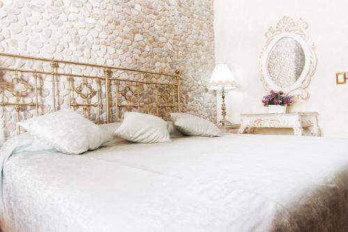 Кровать или кровати в номере Na-anché Hotel